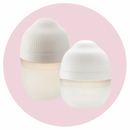 Mombella Zestaw silikonowych butelek antykolkowych dla noworodka Breast Shape Ivory - 120 i 210 ml
