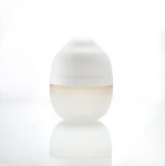 Mombella Butelka Antykolkowa dla Noworodka Breast Shape Ivory Silikonowa 120 ml tył mood.png