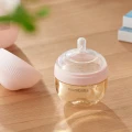 Mombella Butelka Antykolkowa dla Noworodka Breast Shape Old Roze PPSU 120 ml mood 002.png